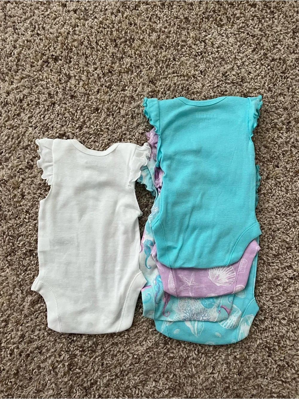 The Children’s Place Newborn 5 Bodysuits & 3 Shorts Set in Pastel Seashell Print